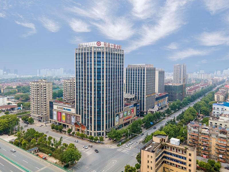 Vienna International Hotel Jiujiang Shili Street المظهر الخارجي الصورة